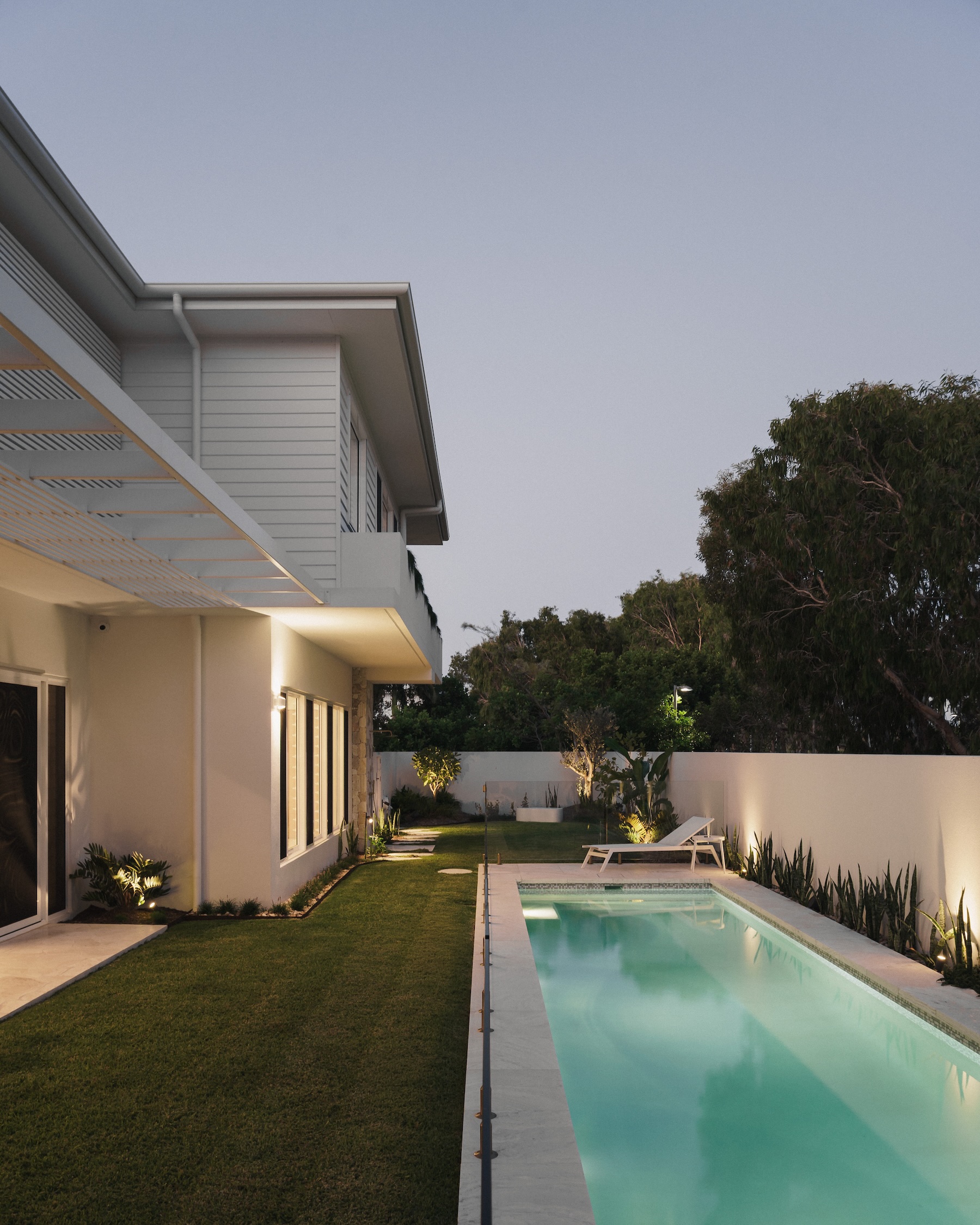 Pool and garden at dusk